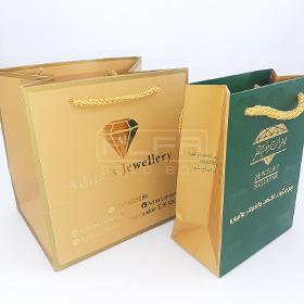 Grün-beige Luxus-Geschenktüten aus Papier