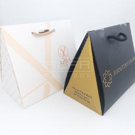 Weiße – schwarze Pyramiden-Luxuspapier-Geschenktüten
