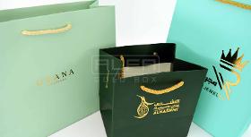 Türkise, grüne und mintfarbene, individuelle Luxus-Geschenktüte aus Papier