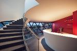 spitzbart Treppe Techne Sphere Leipzig mit geklemmtem Glasgeländer